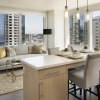 spacious living space with downtown views