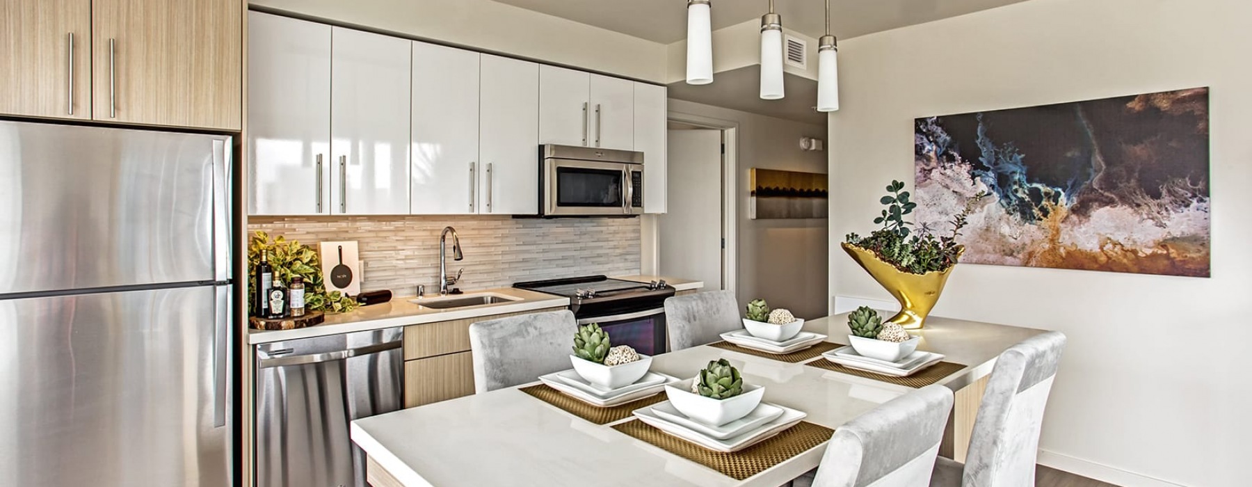 Apartments for Rent in San Francisco, CA - Solaire Kitchen with stainless steel appliances, and modern wood cabinets